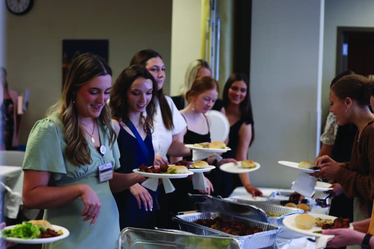 awardees in buffet line