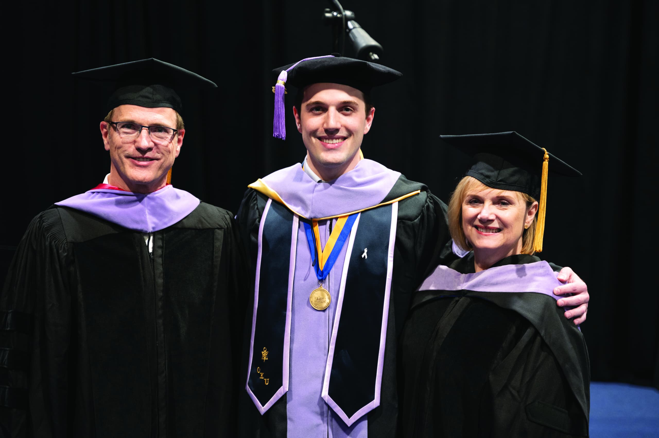A legacy family in cap and gown