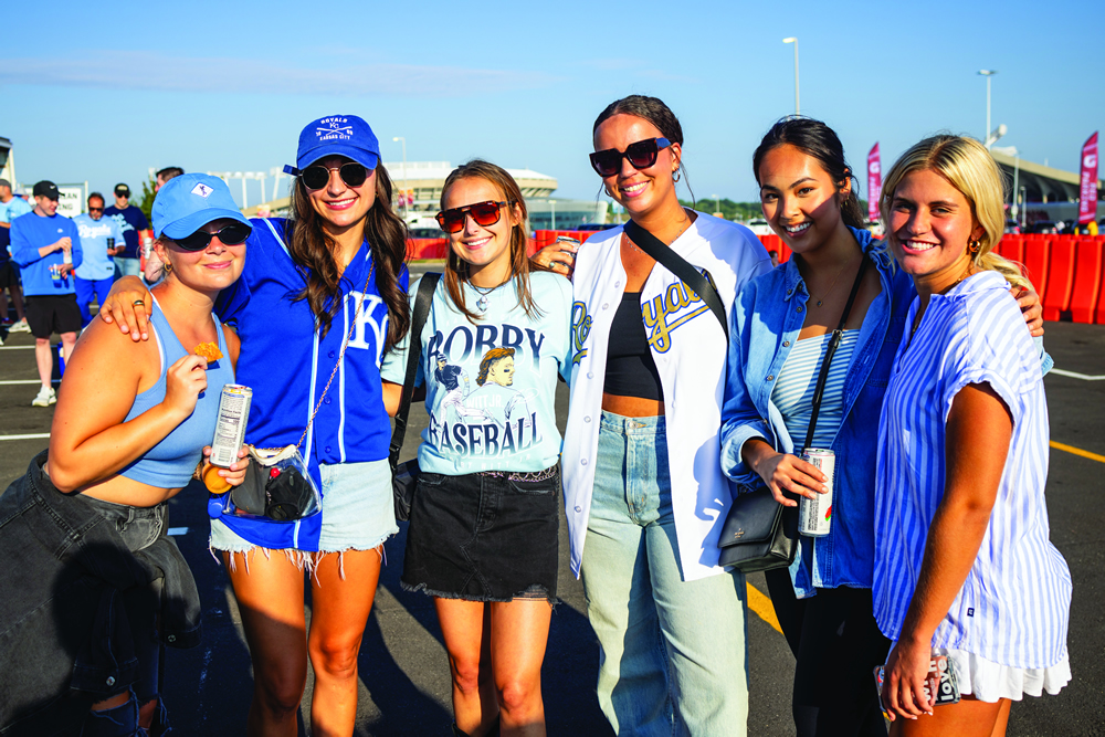 group photo of six people at the game