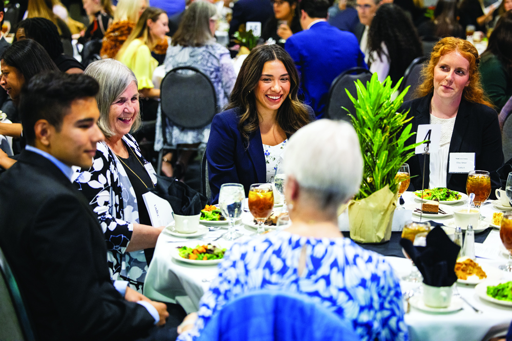 attendees aseated at table