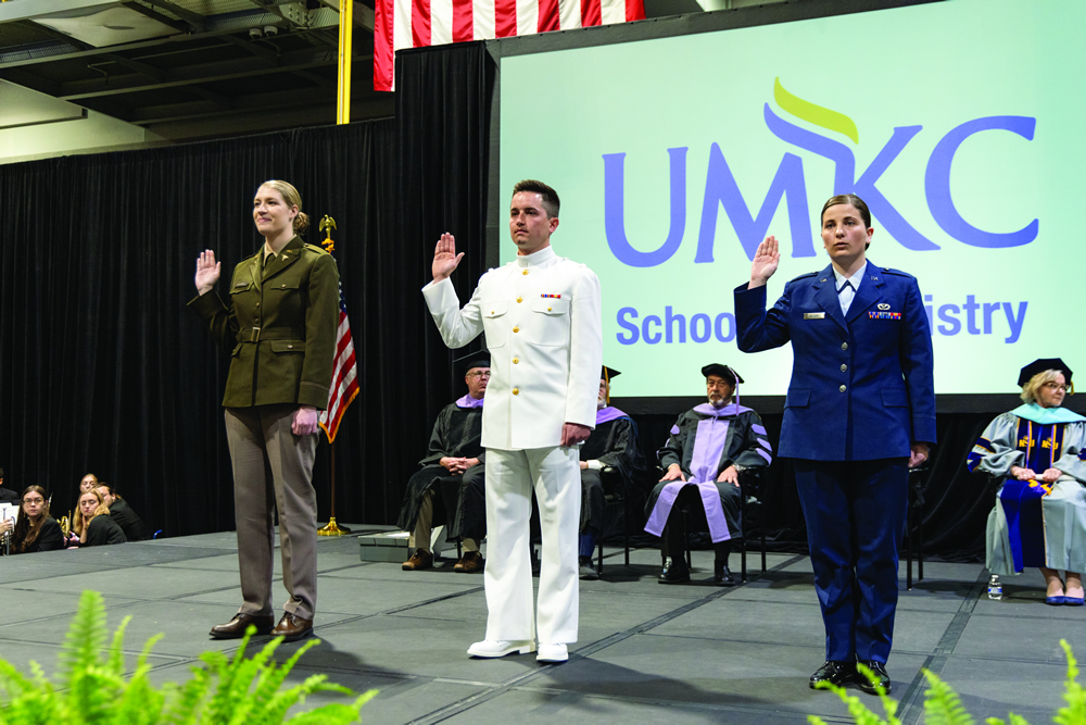 three people taking thier oath