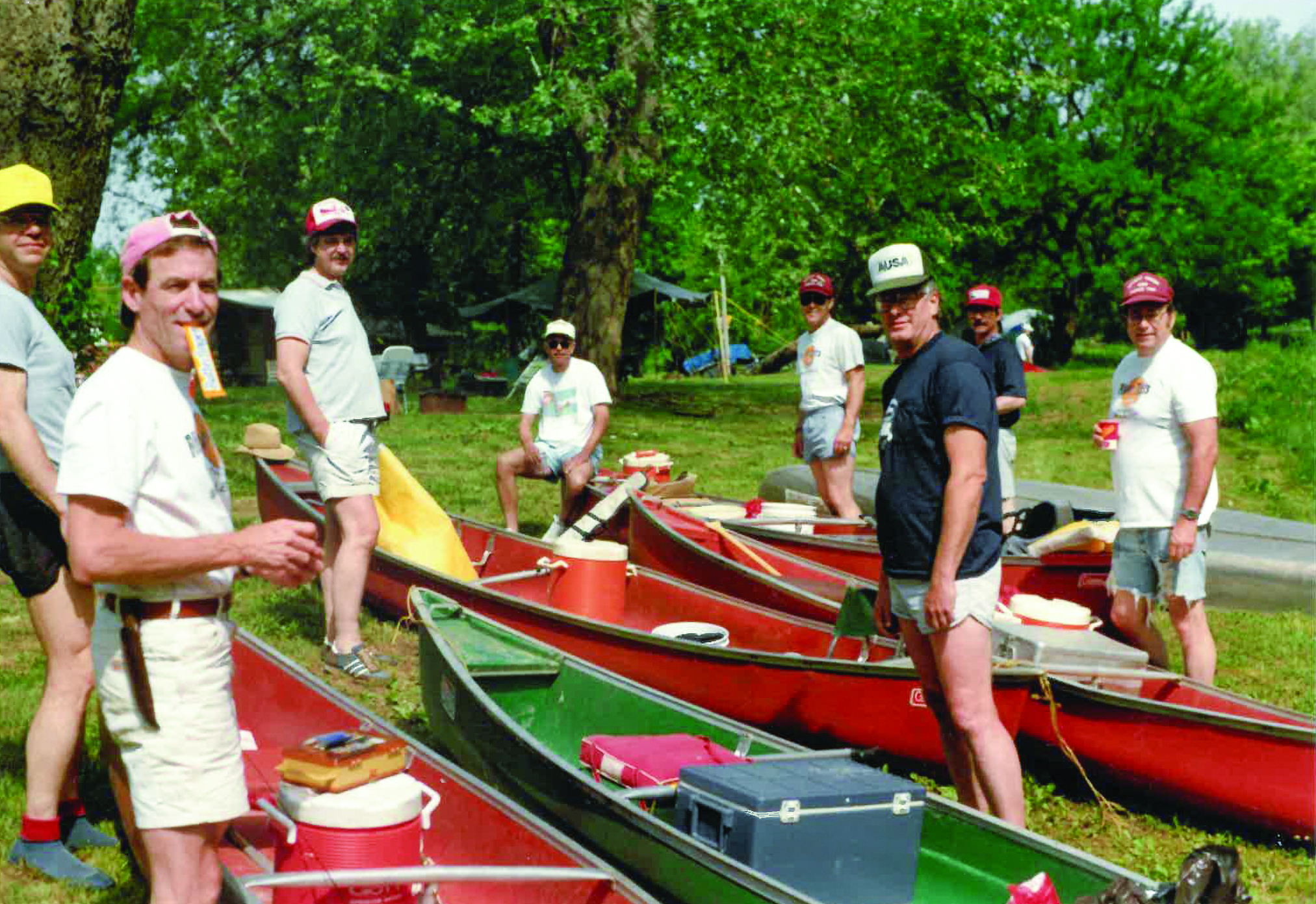 individuals with thier canoes