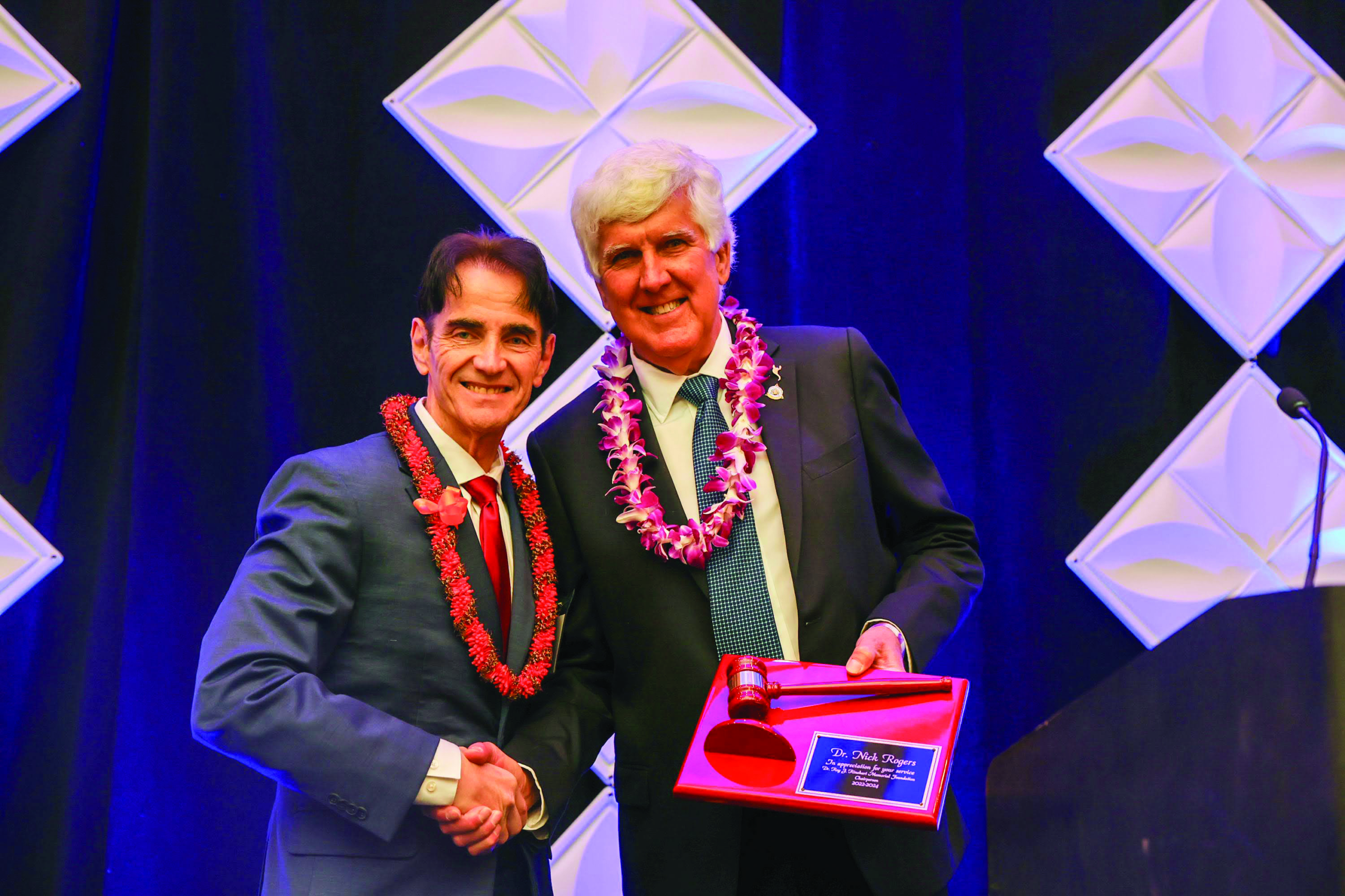 two men shakig hands