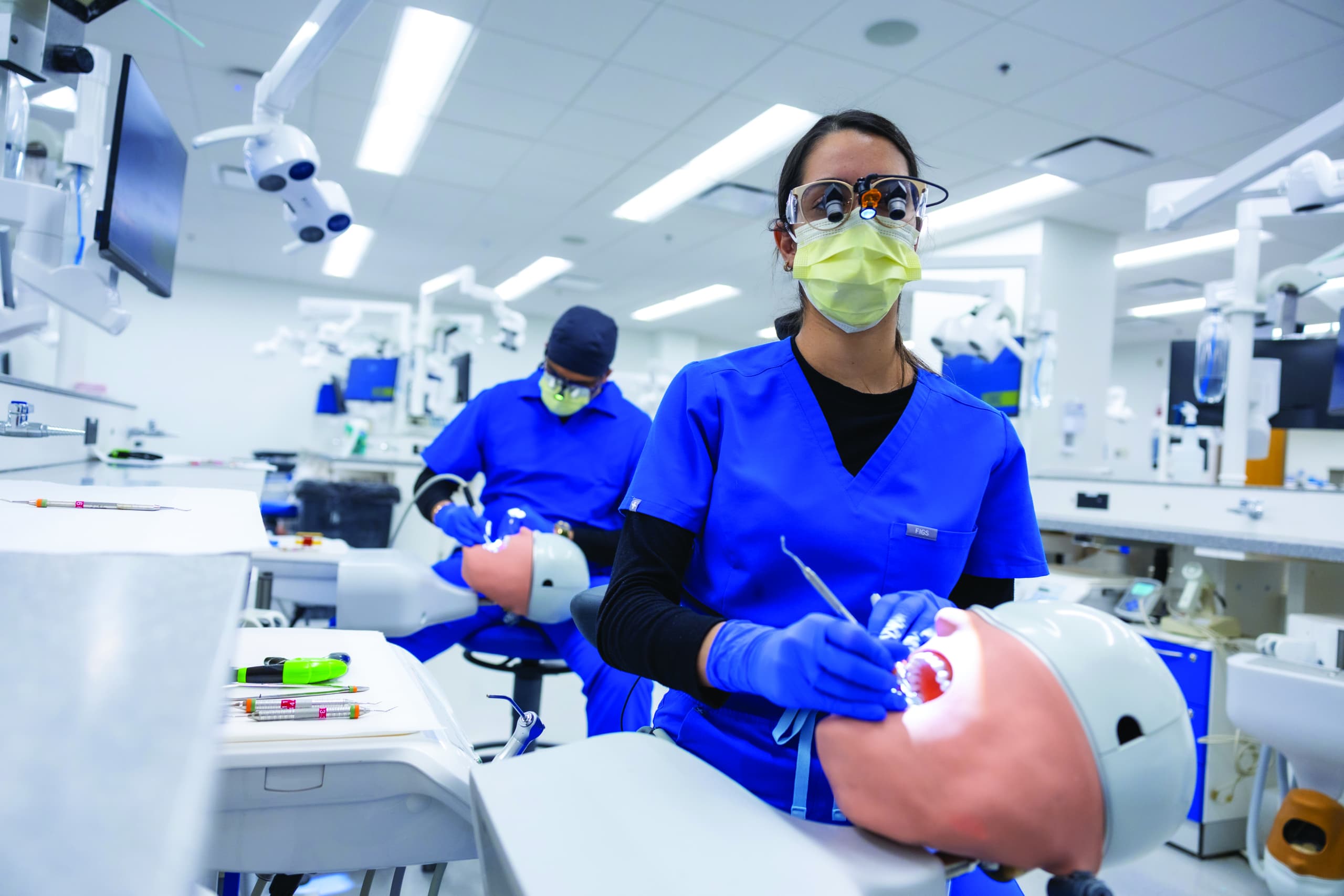 dentist working on simulation patient